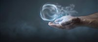 Hand holding glowing digital sphere with light particles, representing technology, innovation, and digital transformation concepts for business and futuristic design.