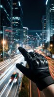 Hand wearing black tactical gloves displays holographic data interface above night city street with traffic lights and tall buildings, representing technology, connectivity, and urban innovation.