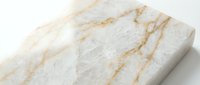 White marble slab with golden veins isolated on white background for luxury interior design, countertops, flooring and architectural projects.