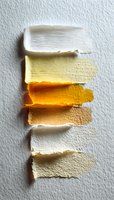 Textured paint swatches in warm tones from white to yellow, orange, and beige on white paper background, arranged in vertical gradient for artistic projects.