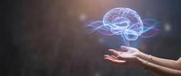 Glowing digital brain hologram floating above open hands with energy waves, representing artificial intelligence, neuroscience and mental health concepts.