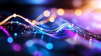 Glowing wavy lines with sparkles and bokeh effects in blue and purple colors create magical abstract background with blurred light spots and dynamic motion.