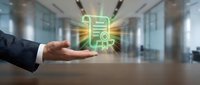 Businessman hand presenting glowing green QR code hologram in modern office lobby for digital payment and contactless technology solutions.