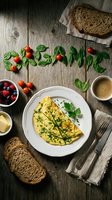 Herb omelette on white plate with whole grain bread, berries, coffee and word organic made of spinach leaves and tomatoes on rustic wood.