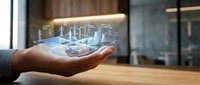 Businessman hand displaying holographic smart city technology with digital buildings and network connections in modern office environment.