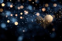 Sparkling golden heart with bokeh lights on dark blue background. Romantic glittery decoration for Valentine's Day, wedding, anniversary celebrations.