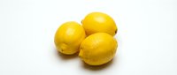 Fresh yellow lemons isolated on white background, ready for culinary, food, beverage, and wellness design projects.