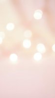Soft pink gradient background with white bokeh lights creating dreamy atmosphere for romantic designs, wedding invitations, and feminine branding projects.