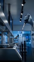 Scientist hand in protective glove using pipette to transfer liquid sample into test tubes in modern laboratory for research and analysis.