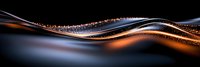 Glowing copper and blue waves flow with sparkling particles against dark background creating dynamic abstract motion effect for luxury design projects.