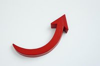 Red curved upward arrow symbol on white background, isolated dimensional shape representing growth, success, and positive direction for business presentations.