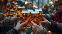 Friends toasting with beer mugs at outdoor winter market with festive lights and warm atmosphere creating celebratory holiday gathering moment.