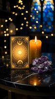 Mystical tarot card with burning candle and amethyst crystals on dark surface with warm bokeh lights creating magical atmosphere for spiritual readings.