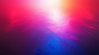 Vibrant abstract background with blending red, purple and blue colors creating atmospheric depth effect, soft light rays and ethereal mood for creative designs.