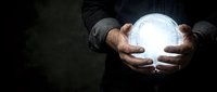 Businessman hands holding glowing light bulb in dark background representing innovation, creativity, bright ideas and future technology solutions.