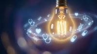 Glowing vintage light bulb with floating medical icons including stethoscopes, hearts, pills and syringes on dark blue background for healthcare innovation.