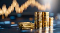 Stacks of golden coins on financial chart background with bokeh light effects showing market growth and investment success trends in business concept.