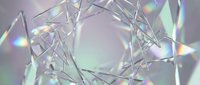 Abstract holographic crystal structure with iridescent rainbow reflections and geometric faceted surfaces creating prismatic light effects for modern design.