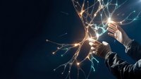 Businessman holding glowing network connections with sparkling light effects representing digital innovation and technology solutions for modern business.