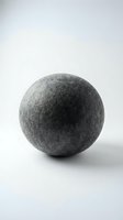 Gray felt wool ball sphere isolated on white background for craft projects and minimalist design concepts.
