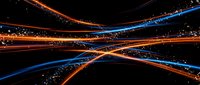 Abstract flowing light trails in orange and blue colors creating dynamic energy waves with sparkling particles on black background for digital art projects.