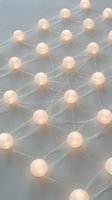 Illuminated spheres connected by translucent lines form an abstract network structure, representing data connectivity, communication systems, and digital infrastructure for technology and business concepts.