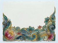 Ornate floral border with gold swirls, teal leaves, and pink lotus blooms on cream textured paper, perfect for greeting cards and invitations.