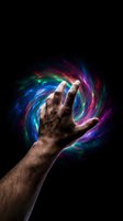 Male hand reaching toward swirling colorful energy vortex with vibrant blue purple green light effects on black background for fantasy designs.