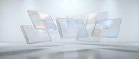 Transparent glass panels with glowing digital interfaces arranged in a curved formation on reflective surface, representing data visualization, cloud computing, and modern technology solutions.