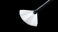 Fan brush with black handle and white bristles isolated on transparent background, ready for design use on t-shirts, clipart, stickers, and print-on-demand products.