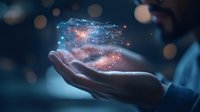 Magical glowing galaxy particles floating above open palm in dark atmosphere with bokeh lights, representing spiritual energy, dreams and universe connection.