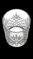 Crystal whiskey glass with intricate cut patterns isolated on transparent background, ready for design use on product mockups, packaging, and print materials.