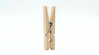 Wooden clothespin with metal spring mechanism isolated on white background, ready for laundry, crafts, and design projects.