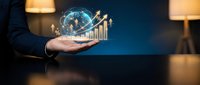 Businessman holding glowing globe with upward trending financial charts and growth arrows, representing global business expansion, international trade, economic development, and investment success.