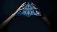 Hands protecting glowing blue geometric cube structure representing data security, blockchain technology, and digital protection concepts for business.