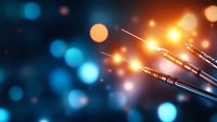 Glowing fiber optic cables transmitting data with orange light streaks and blue bokeh background, modern digital communication network concept.