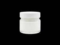 Cosmetic jar with white lid and clear glass container filled with cream or lotion, isolated on transparent background ready for beauty product packaging, skincare branding, e-commerce, and design projects.