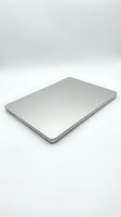 Closed silver laptop computer displayed at an angle on white background. Use for technology, business, education, and product mockup designs.