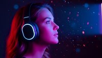 Young Asian woman wearing white headphones in profile with colorful neon lighting and bokeh background for music and technology concepts.