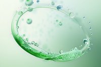 Dynamic swirling water splash with floating bubbles in green tones against soft mint background, creating fresh circular motion effect for wellness products.