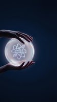 Hands protecting glowing sphere with space commerce atomic symbol on dark blue background representing future business technology and innovation.