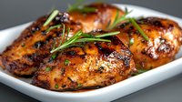Grilled chicken breasts with herbs and spices in white dish, perfectly cooked poultry with caramelized surface for restaurant menu and cooking content.
