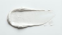 White paint stroke or cream texture smear on isolated background, suitable for design projects, cosmetics packaging, skincare product mockups, and artistic compositions.