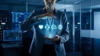 Professional businessman in suit holding glowing digital healthcare icons in modern office environment showcasing medical technology innovation.