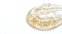 Inflatable golden glitter swim ring pool float isolated on white background for summer vacation and water recreation design projects.