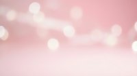 Soft pink bokeh background with dreamy light circles creating elegant atmosphere for romantic designs, wedding invitations, and feminine branding projects.