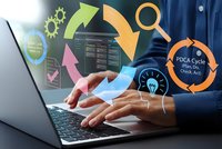 Business professional implementing PDCA cycle methodology on laptop with colorful process arrows and quality management icons for continuous improvement.