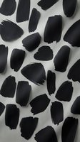 Black paint brush strokes and marks scattered on white background. Abstract artistic pattern with organic shapes for modern design, art projects, and creative backgrounds.