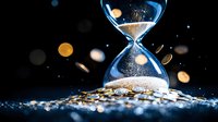 Glowing hourglass with golden coins and sand against dark background, time and money concept symbolizing financial decisions and investment timing.