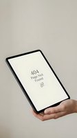 Hand holding tablet device displaying 404 error message on screen against neutral background. Suitable for web design, app development, error page templates, and digital communication projects.